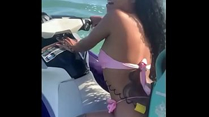 Young mega-breezy left her husband on the beach and had wrath with the lecturer on the jet ski.