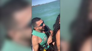 Young mega-breezy left her husband on the beach and had wrath with the lecturer on the jet ski.